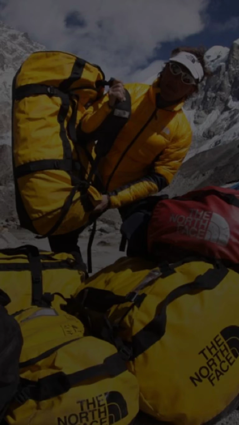 A mountaineer transports his gear in the Himalayas.