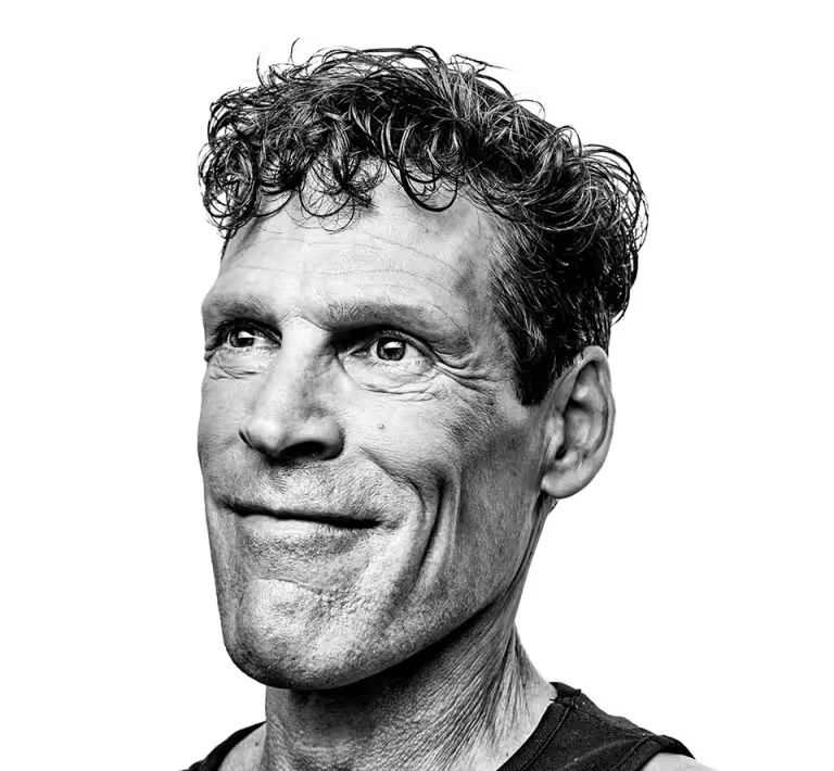 Ultra-runner, Dean Karnazes, is portrayed in a black and white portrait.