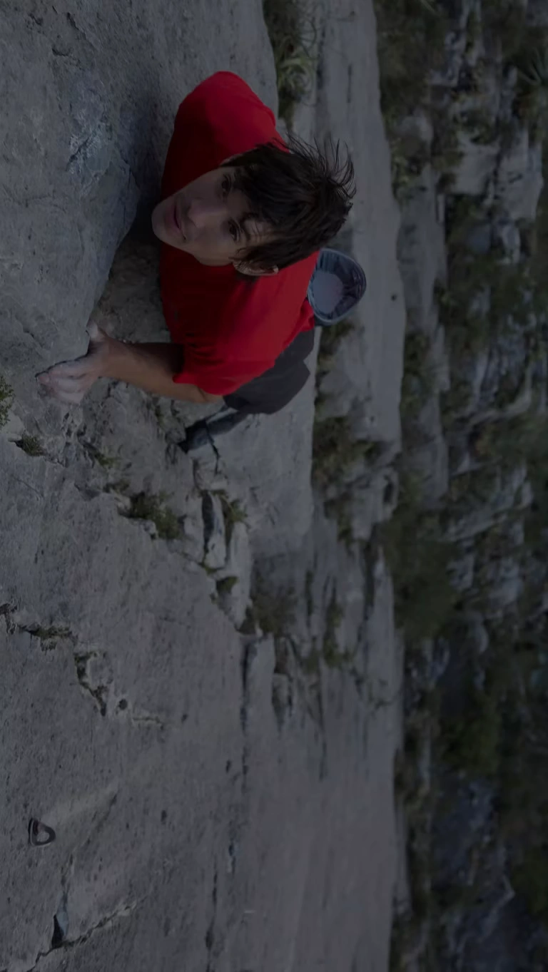Climber, Alex Honnold, visualizes his next move while completing the first free solo ascent of El Capitan.